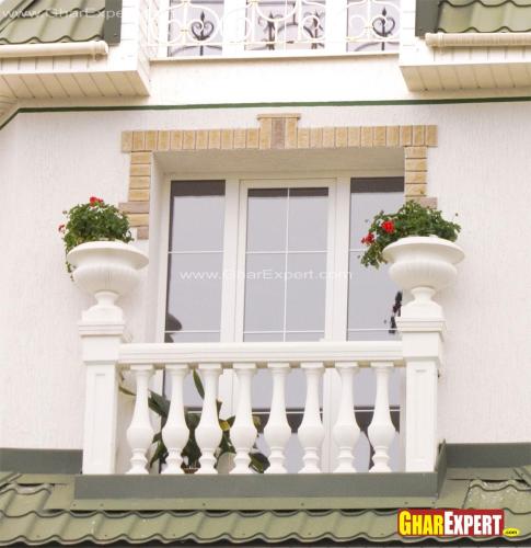 French Balcony with planters in railing posts