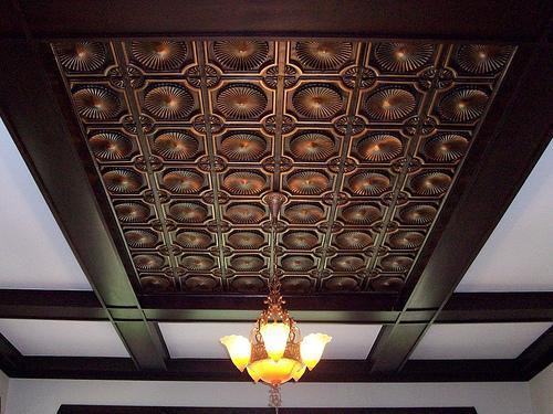 Tin Ceiling Design with Wooden Beams