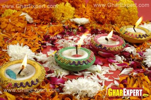 Use colorful diyas and flowers on ganesh chaturthi